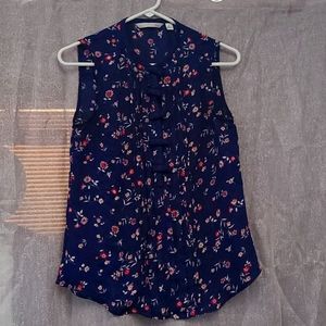 High neck button front blouse with cute bow detail.